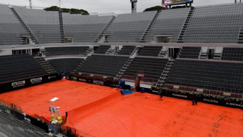 A wet scene at the Italian Open on Wednesday