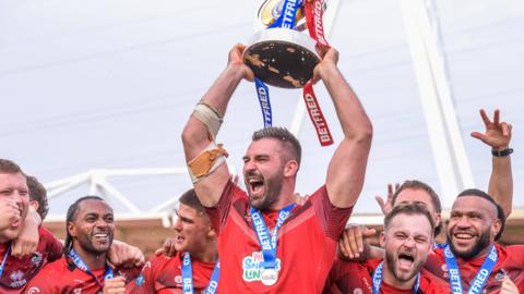 London Broncos captain Will Lovell lifts the Championship Grand Final Trophy