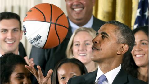 President Obama, shown with a baskeball in 2015