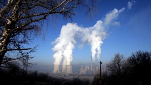 A general view of steam rising from the cooling towers of a coal fired thermal power plant in Tuzla, Bosnia and Herzegovina, 12 December 2018.