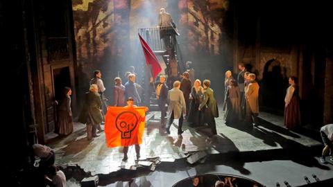 Les Miserables theatre performance being disrupted by Just Stop Oil protester