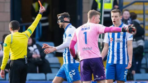 Lewis Mayo is shown a red card against Dundee