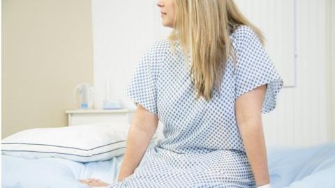 Woman in doctor's office for check up