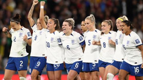 England players celebrate beating Nigeria at the Women's World Cup