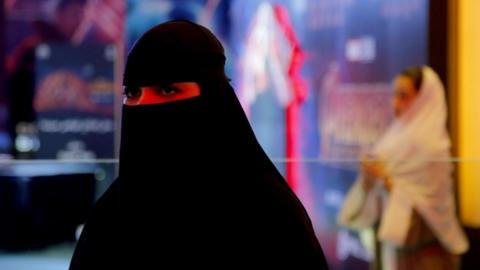 Woman at cinema, Riyadh, Saudi Arabia