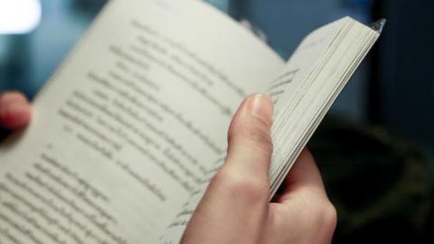 Close up of a book being read
