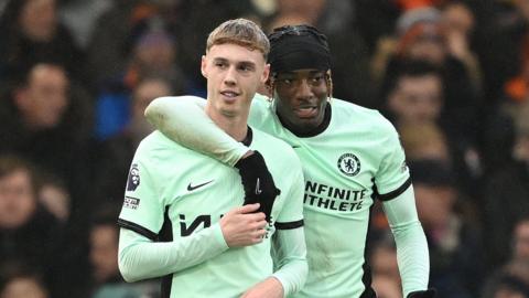 Cole Palmer and Noni Madueke celebrate scoring for Chelsea