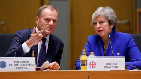 British Prime Minister Theresa May (R) and European Union Council President Donald Tusk