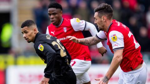 Sheffield United's Iliman Ndiaye and Rotherham United's Grant Hall