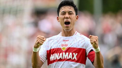 Wataru Endo celebrates