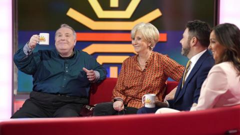 Astrologer Russell Grant, Former presenter Debbie Rix with presenters Jon Kay and Sally Nugent on the red sofa as 鶹Լ Breakfast celebrate its 40th anniversary with a special show and guests at MediaCityUK, Salford