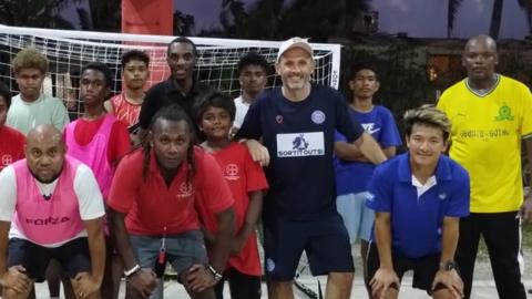 Justin Walley (fourth from right) with players on the Marshall Islands