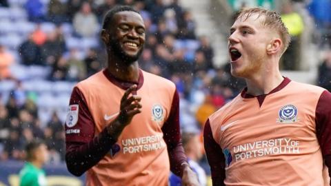 Portsmouth forward Paddy Lane celebrates his goal at Wigan