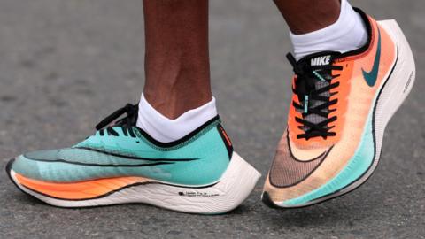 A runner wearing Vaporfly shoes at the Dubai Marathon in January