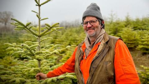 John Charles-Jones is sending proceeds from Christmas tree sales to Ukraine