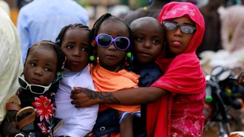 Children are seen on a motorbike after Muslims in Nigeria perform Eid prayer following the global outbreak of coronavirus disease (COVID-19) in Nasarawa May 24, 2020.