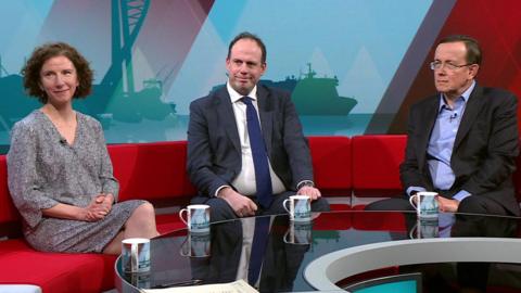 Anneliese Dodds, Greg Smith, and Martin Tod sit on a long red sofa in a BBC studio.
