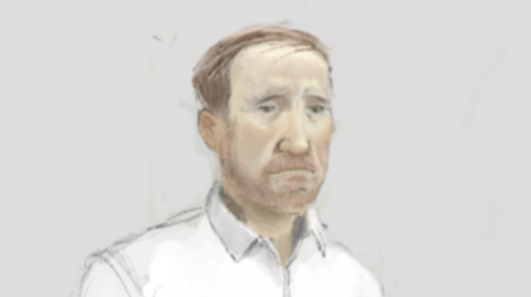 Illustration of a man with short ginger hair and beard in a white shirt