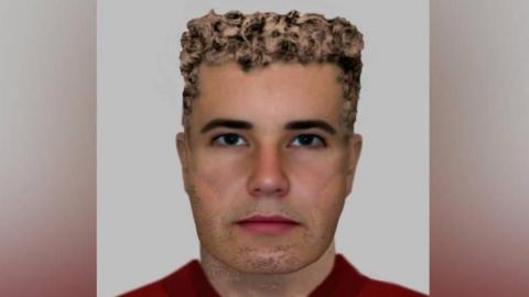E-fit of a white man in his 30s or early 40s. He has stubble and is wearing a red top. He has light brown curly hair which is short at the sides and long on top.