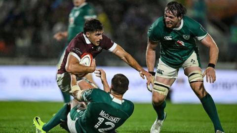 Stuart McCloskey makes a tackle