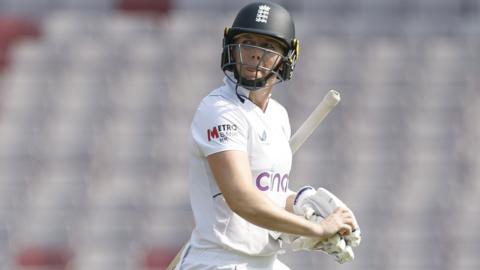 England captain Heather Knight looks disappointed as she walks off the pitch having been dismissed v India