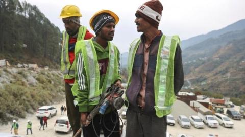 Rat miners" stand before they begin manual drilling as rescue operations are in progress after workers got trapped in a collapse of an under-construction tunnel, in Uttarkashi in the northern state of Uttarakhand, India, November 27, 2023.