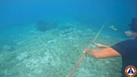 Filipino coast guard cuts China barriers in Scarborough Shoal in South China Sea