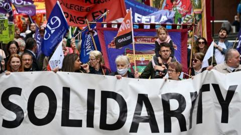 Protesters support striking RMT workers in Glasgow in June