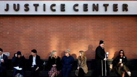 Reporters and members of the public line up early to enter the Leonard Williams Justice Center where Dominion Voting Systems is suing FOX News in Delaware Superior Court