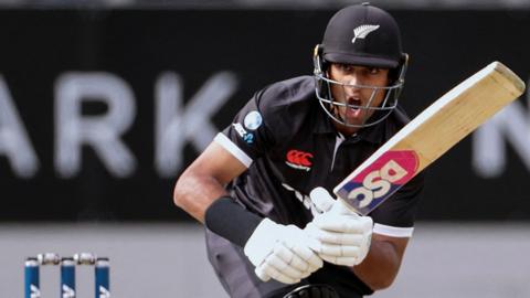 New Zealand's Rachin Ravindra plays a shot
