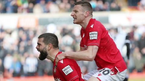 Wrexham goalscorers Elliot Lee and Paul Mullin celebrate