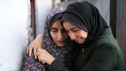 Palestinians mourn those killed in air strikes in Rafah, southern Gaza Strip12 February 2024
