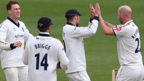 Chris Rushworth celebrates a wicket for Warwickshire