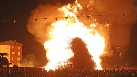Bonfires, like this one in Portadown, were lit across Northern Ireland over the weekend