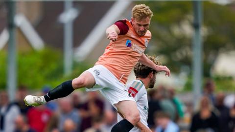 Jack Sparkes in aerial combat in a pre-season friendly against Bognor Regis