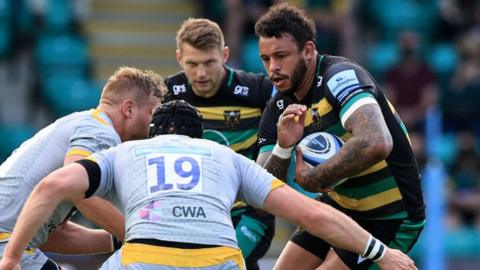 Courtney Lawes runs with the ball for Northampton