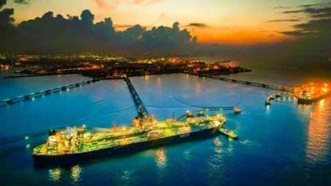 An oil tanker loads off oil at the reception terminal in Qingdao in east China's Shandong province.