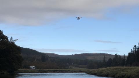 Drone above river