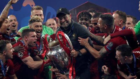 Jurgen Klopp lifts the Champions League trophy