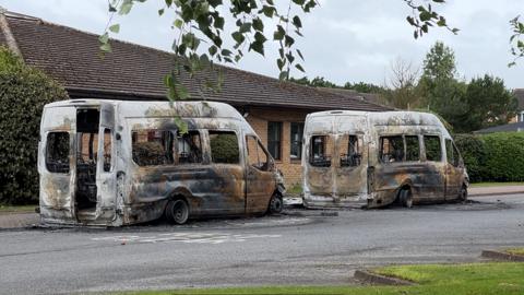 Burnt out minibuses