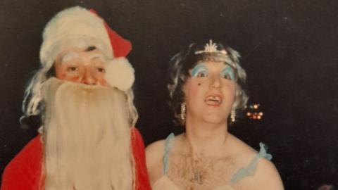 Alan Jones dressed as Father Christmas and Bluecoat Paul Webb dressed as a fairy