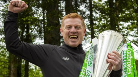 Celtic manager Neil Lennon with the Scottish Premiership trophy