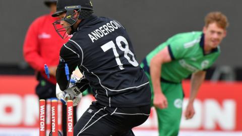 New Zealand's Corey Anderson is dismissed by Irish bowler Craig Young