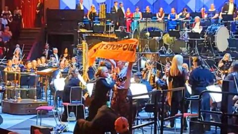 The opening night of the BBC Proms being interrupted by two protesters from Just Stop Oil