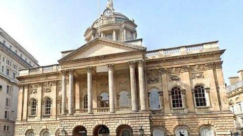 Liverpool Town Hall's front facade, with its neoclassical architecture including columns and a balcony