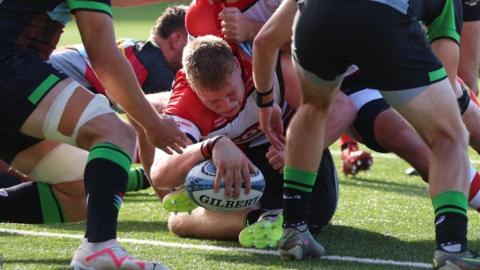 Arthur Clark scores a try