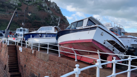 Damaged boats at Bonne Nuit Harbour