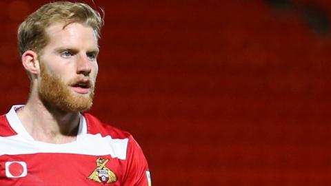 Josh Sims in action for Doncaster