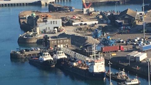 Migrants' boat in Dover harbour