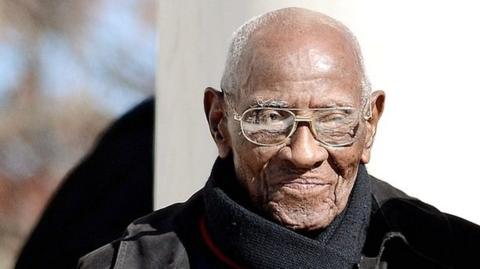 Richard Overton (C) is acknowledged by US President Barack Obama (not pictured) during a ceremony to honour veterans at Arlington National Cemetery in Arlington, Virginia, on 11 November 2013